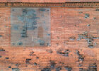 Ludwigstraße 27, Bombensplitterschäden in der Fassade.